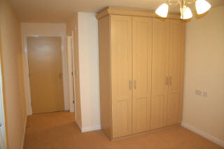 Bedroom 1 showing built-in wardrobes
