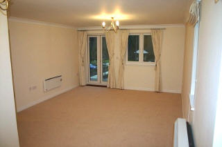 Lounge with door to balcony